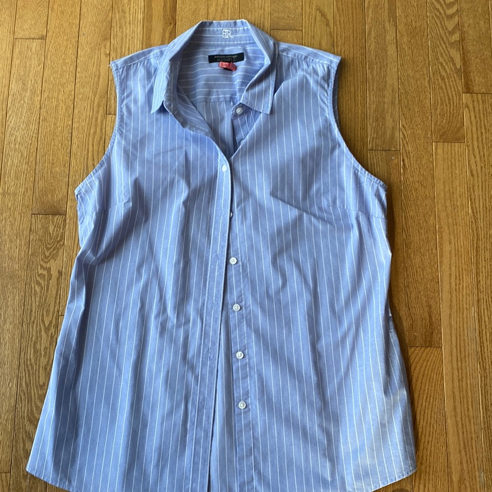 Sleeveless button down dress shirt